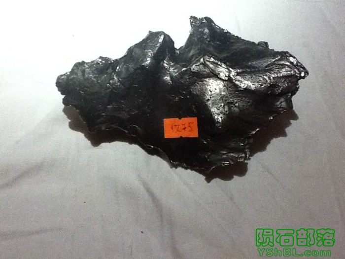1275g